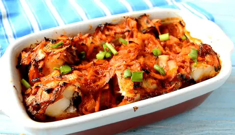 Минтай с морковью и луком в духовке