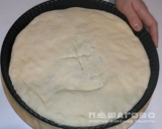 Фото приготовления рецепта: Осетинский пирог с сыром и зеленью - шаг 8